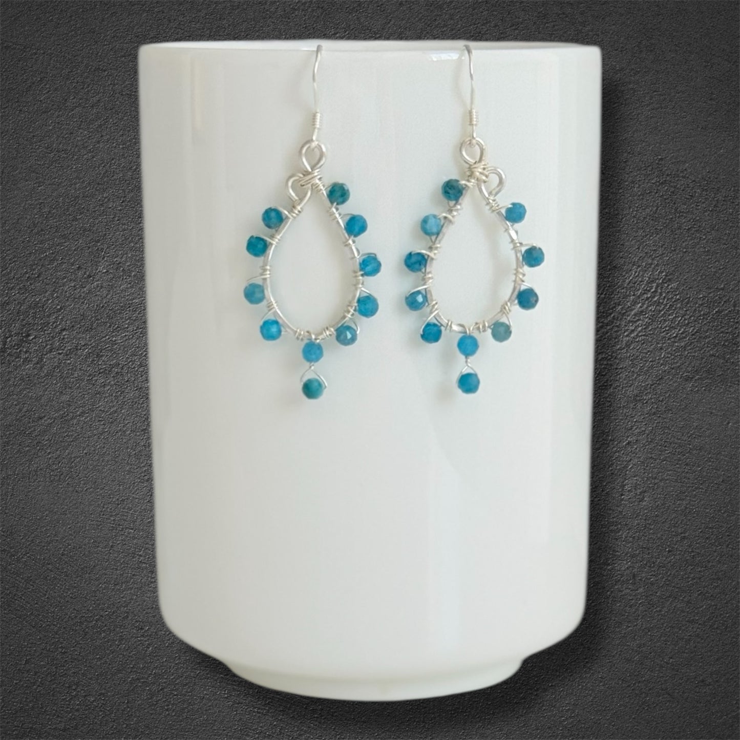 Handmade sterling silver chandelier earring with small faceted blue apatite gemstones