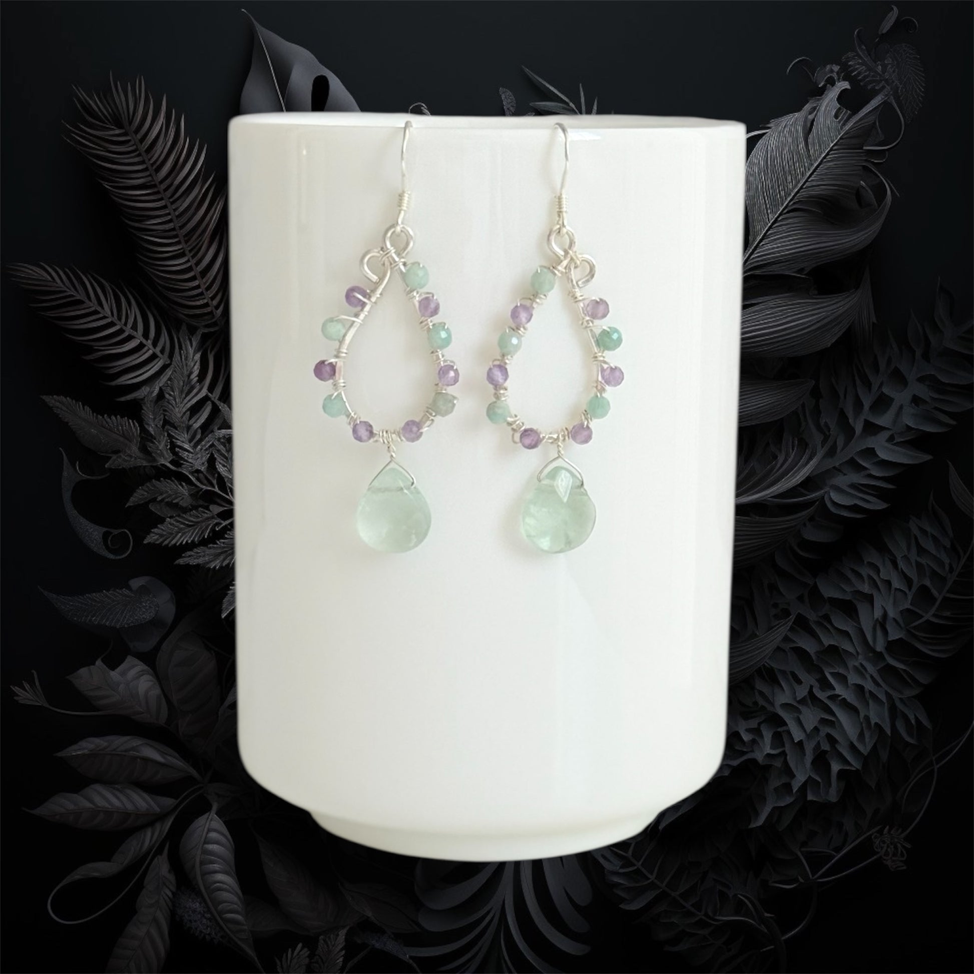 sterling silver earrings made with faceted amethyst and amazonite gemstones, accented with green fluorite