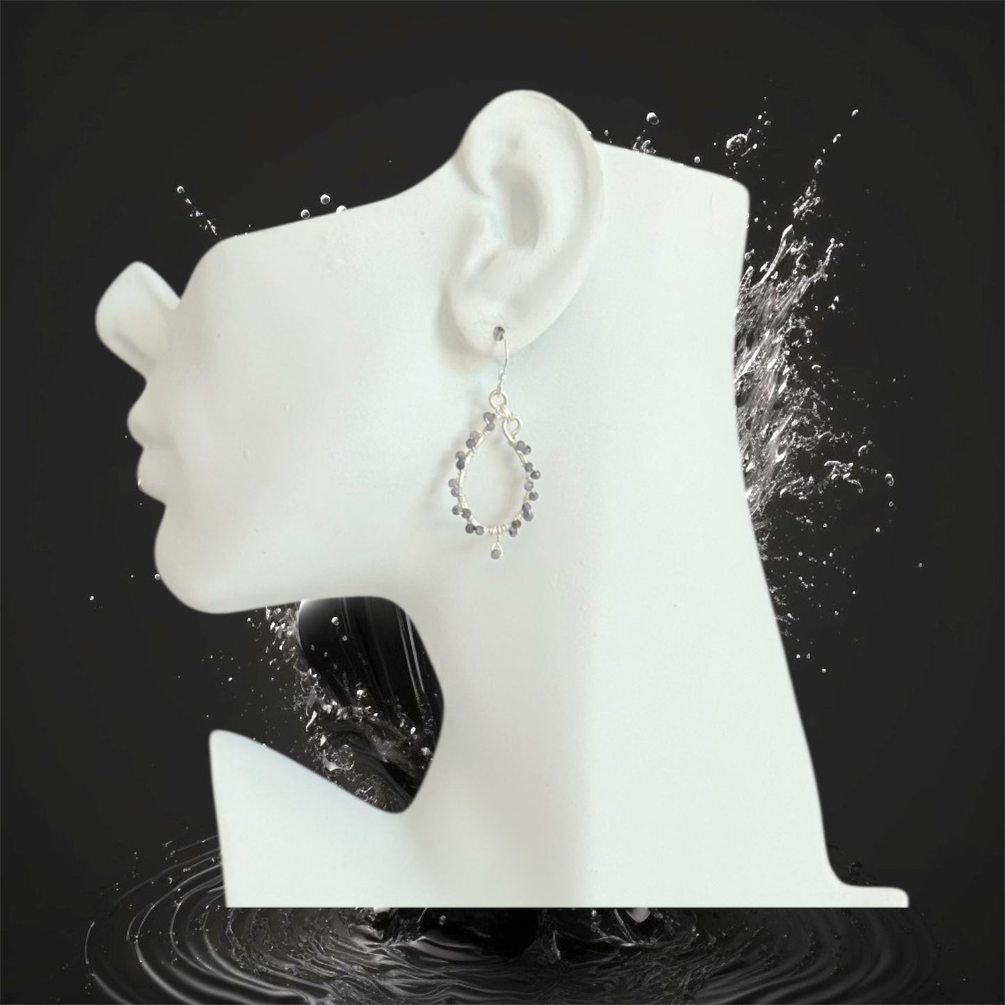 Sterling silver handcrafted earrings with faceted tanzanite gemstones