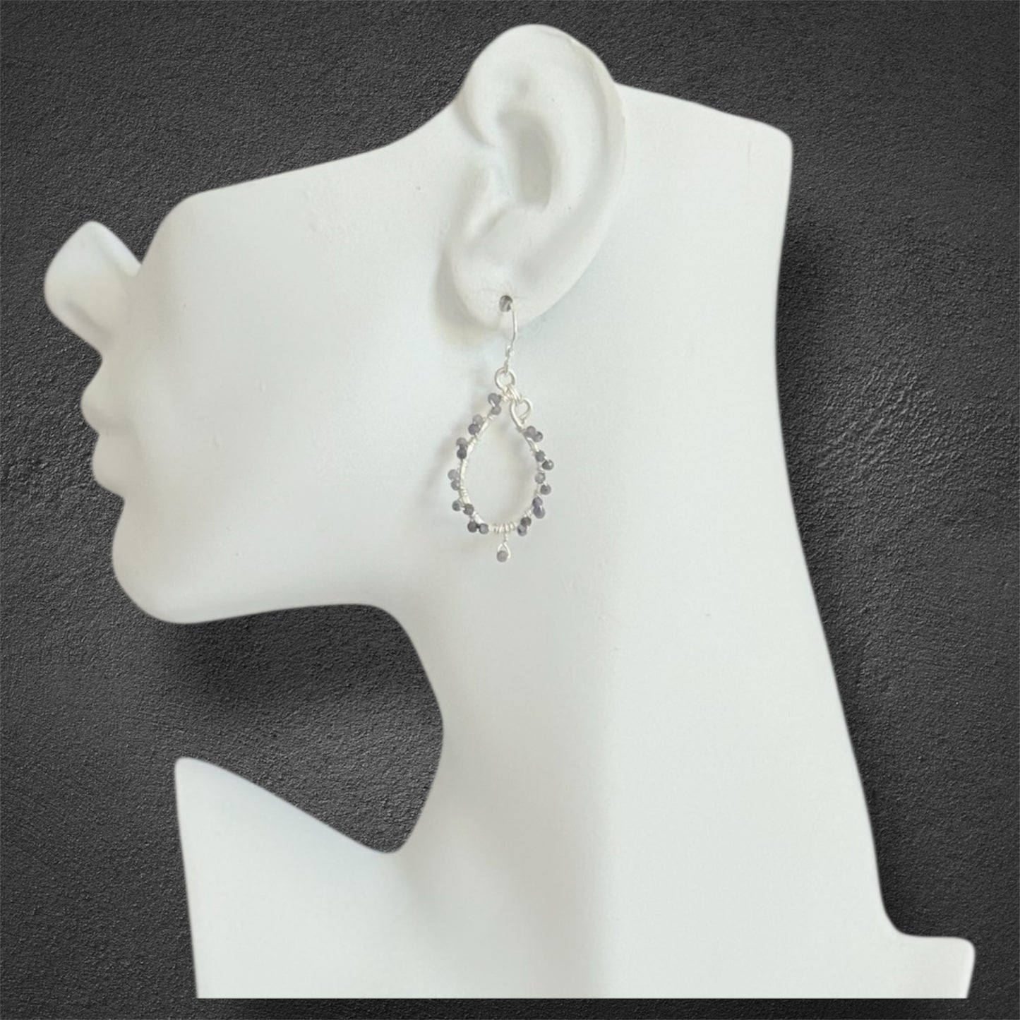 Sterling silver handcrafted earrings with faceted tanzanite gemstones