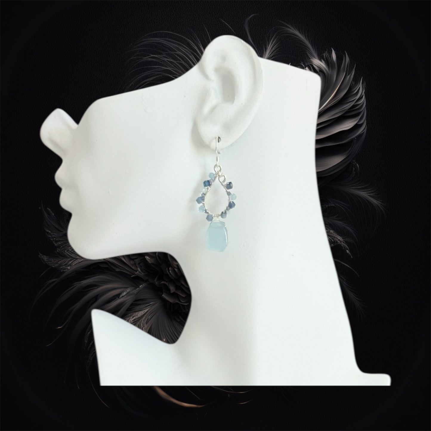 Elegant sterling silver teardrop earrings featuring aquamarine, kyanite and tanzanite gemstones, handmade design