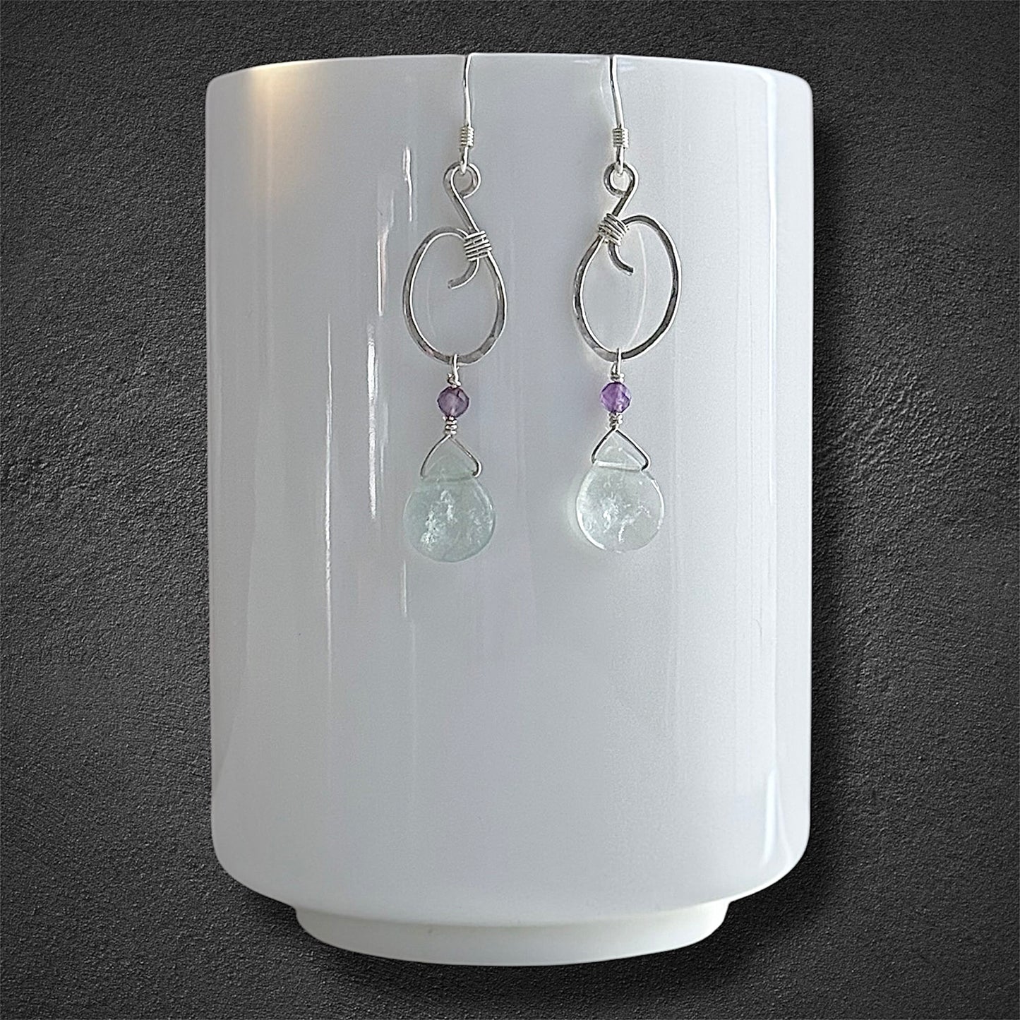 Artisanal handmade sterling silver earrings with green fluorite and amethyst gemstones