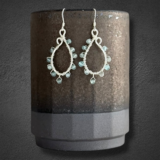 Handcrafted hoops with faceted green apatite gems