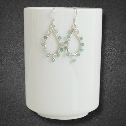 Handcrafted hoops with faceted green apatite gems