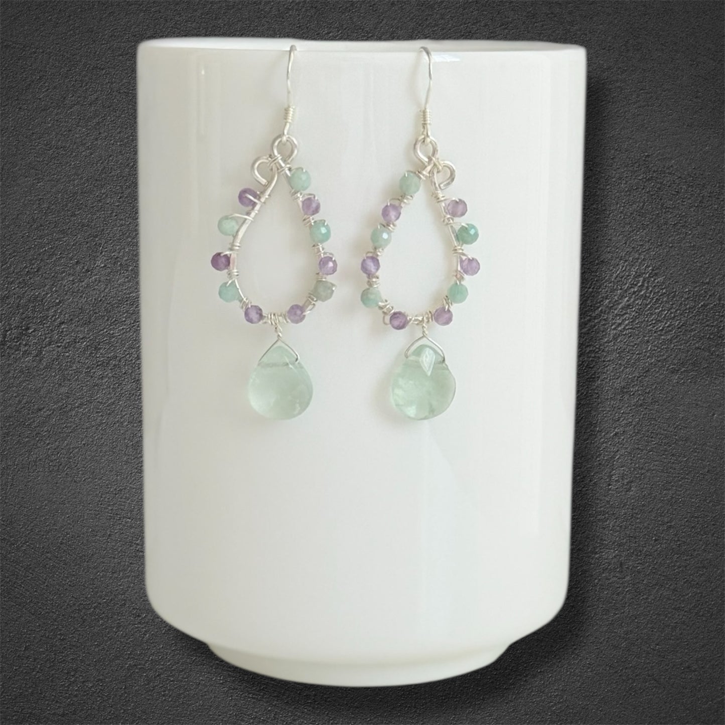 sterling silver earrings made with faceted amethyst and amazonite gemstones, accented with green fluorite