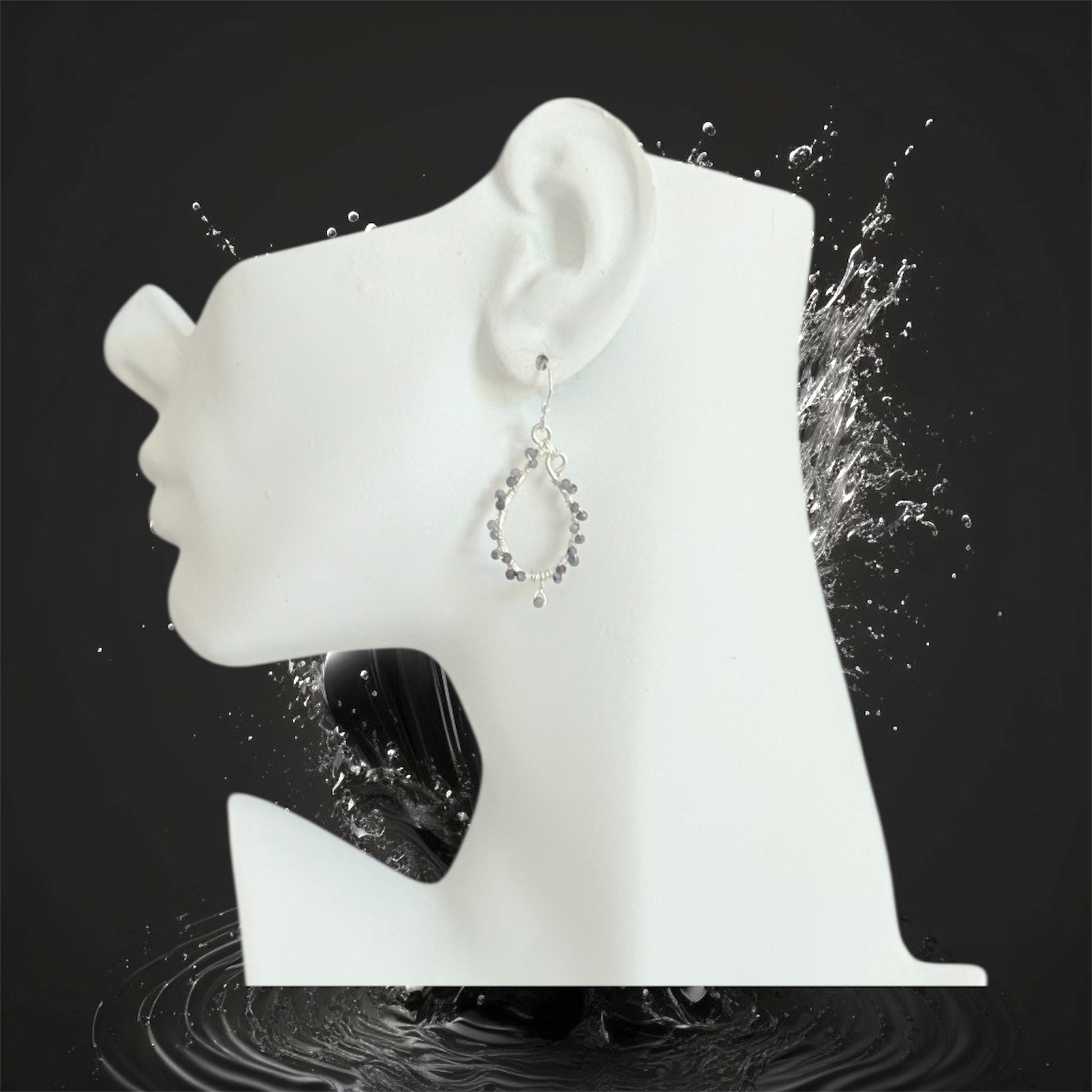 Sterling silver handcrafted earrings with faceted tanzanite gemstones